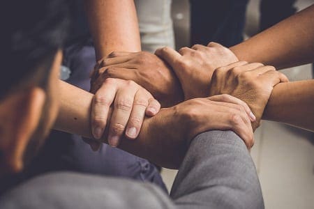 Hands were a collaboration concept of teamwork. Credit: https://www.istockphoto.com/au/portfolio/manop1984