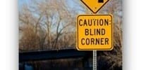 road sign for blind corner