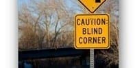 road sign for blind corner